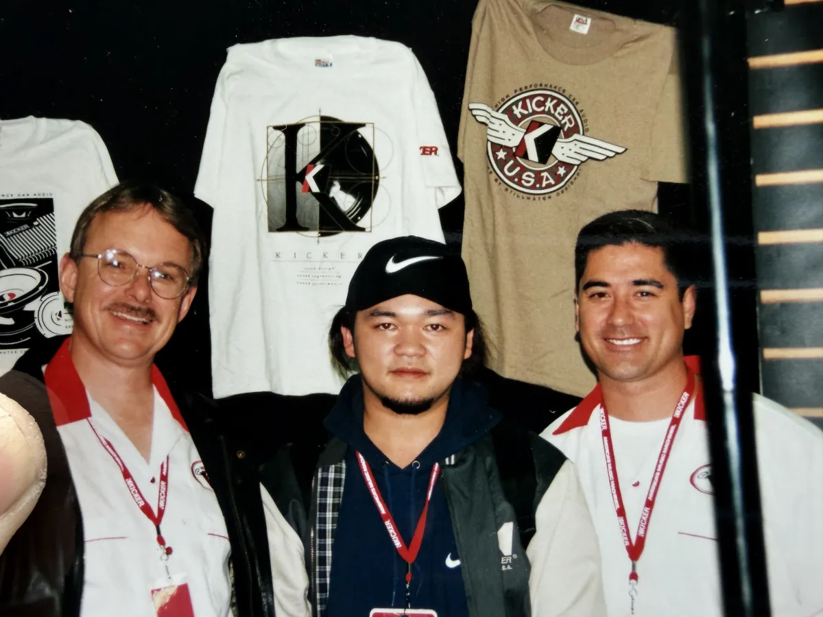 This photo of the store manager in his younger days, taken in 1996, with the president of KICKER when he visited the US 29 years ago.